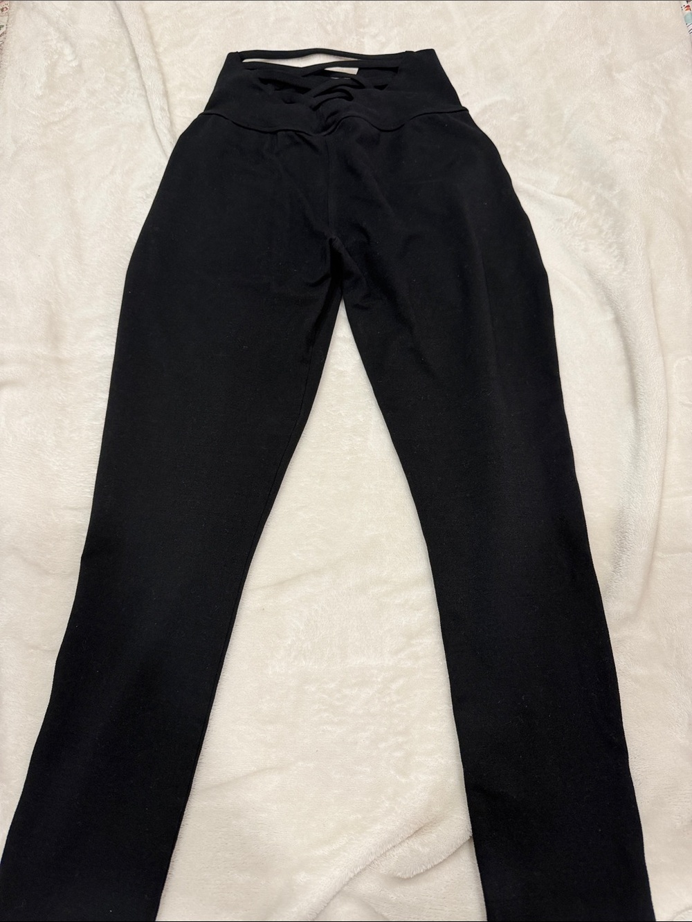 Bombshell Sportswear Black High-Waist Leggings with Crisscross Waist Detail